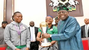 TINUBU-RECEIVES-TROPHY
